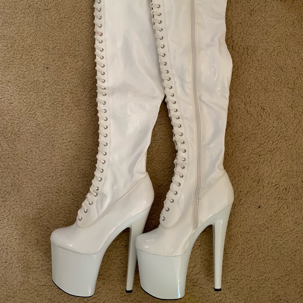 Thigh high white boots